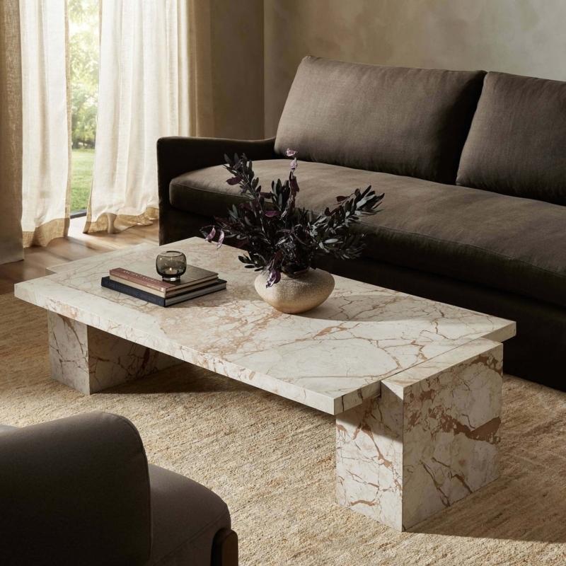 Monolithic Round Coffee Table with Pitted Desert Taupe Stone Texture