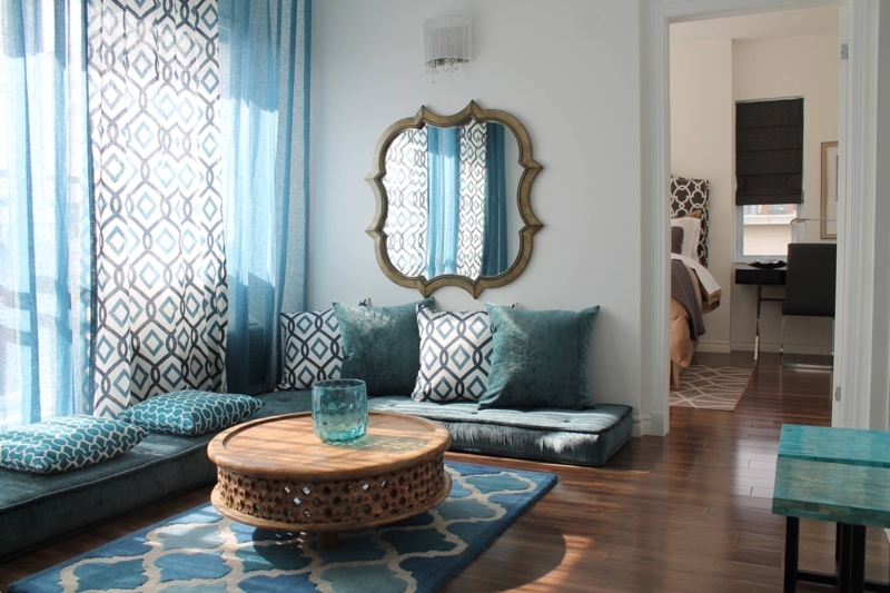 Natural Wood Accent Stools Styling with Gray Tufted Chairs