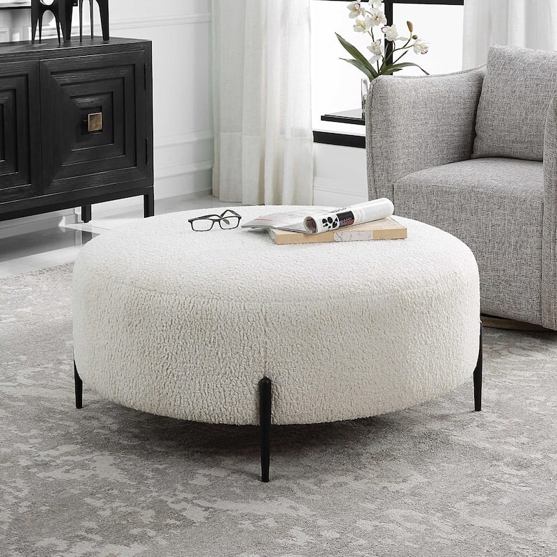 Off-White Faux Shearling Round Ottoman, Black Cross Base