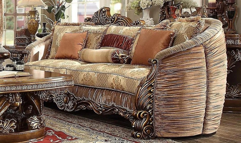 Ornate Sofa with Antique Gold Frame and Intricate Carvings (61 chars)