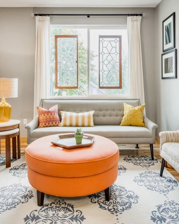 Ottoman Circular Orange Tufted Cocktail Style with Gray Sectional