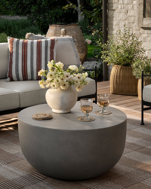Outdoor Coffee Table, Monolithic Stone-Like Finish, Rectangular Block.