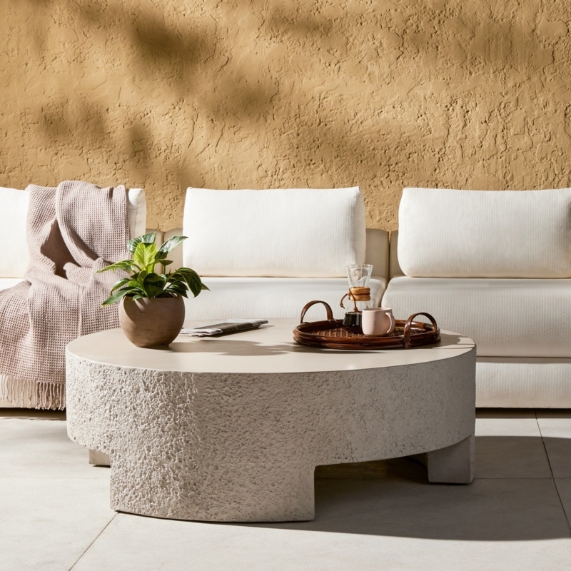 Outdoor Coffee Table, Ribbed Pedestal Base, Matte Stone-Like Finish.
