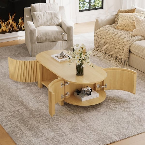 Oval Coffee Table with Fluted Panel Detailing and Storage Cabinets