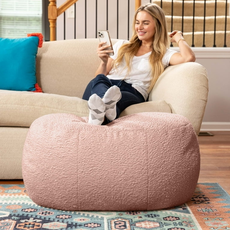 Oval Faux Shearling Pouf for Cozy Nursery Seating