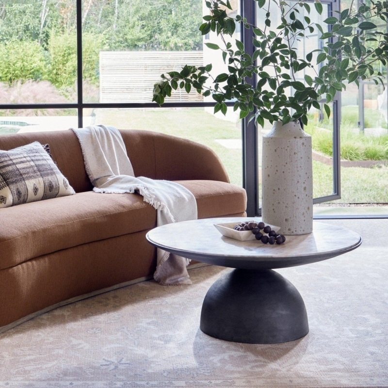 Round Coffee Table with Fluted Pedestal Base and Creamy Marble Top