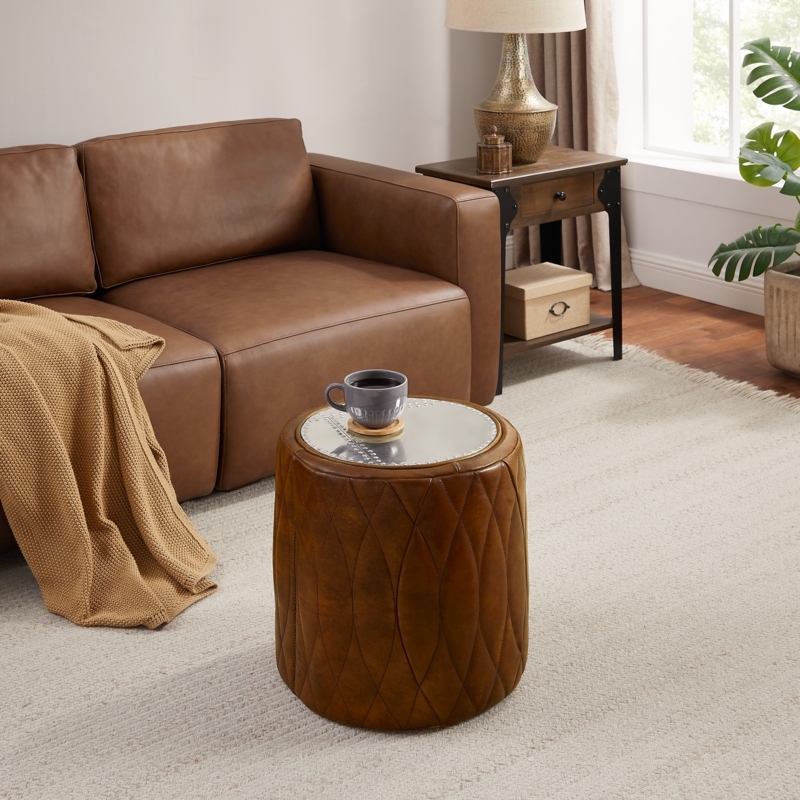 Round Ottoman, Sculptural Ribbed Metal Base Leather Seat