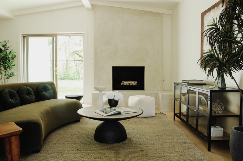 Round Stone Coffee Table with Slim Grey Metal Frame and Circular Base