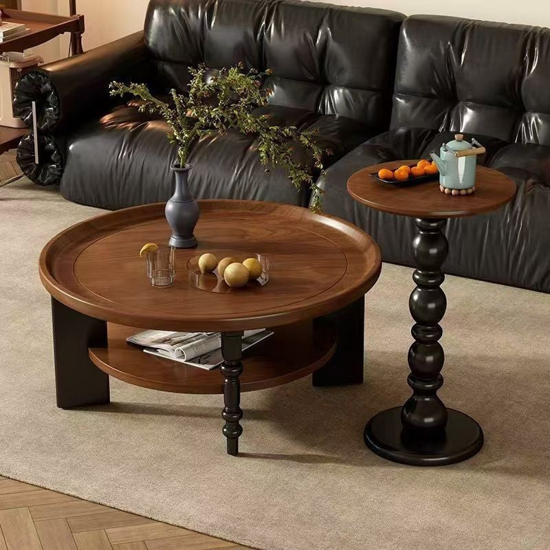Round Two-Tier Coffee Table featuring Tapered Legs and Natural Finish