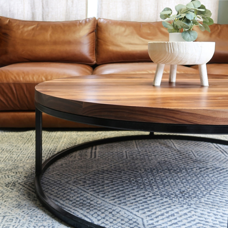 Round Walnut Coffee Table with Minimalist Black Cross Base