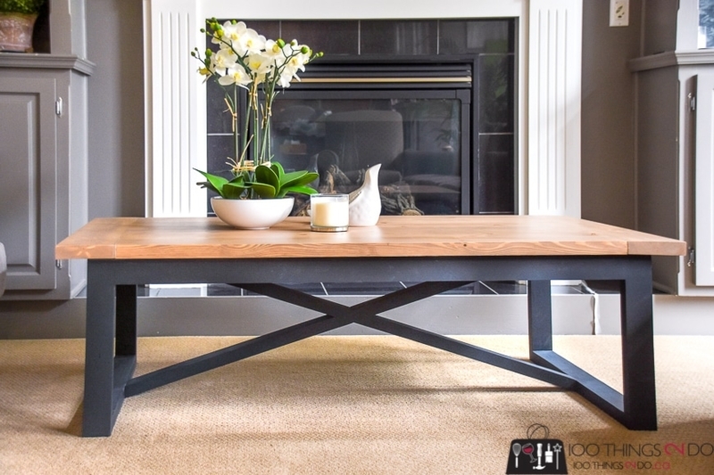Rustic Coffee Table with Distressed Plank Top and Casters