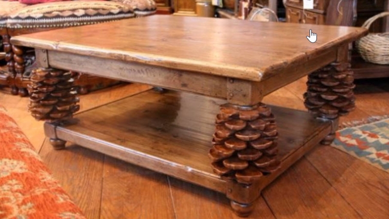 Rustic Wood Coffee Table featuring Pine Cone Carvings and Slab Top