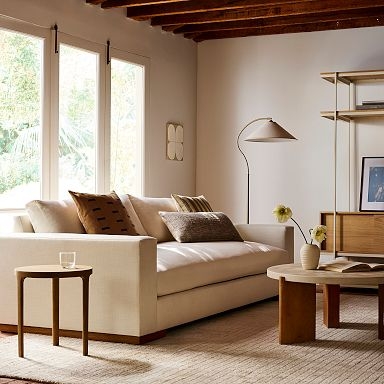 Sofa featuring Bench Seat Cushion and Curved Back, Off-White Boucle
