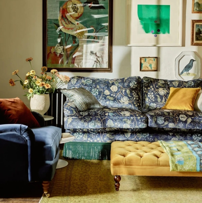 Sofa with Bold Floral Upholstery and Roll Arm Silhouette