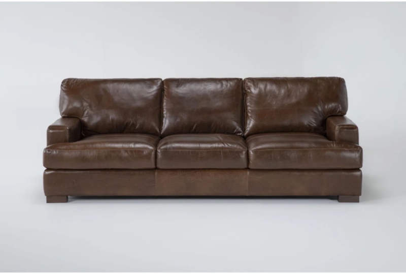 Sofa with Track Arms in Bright Natural Light Modern Cognac Setting