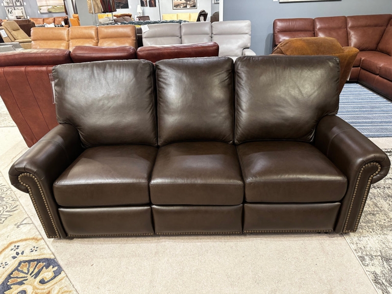 Tan Manual Reclining Sofa with Bustle Back Design