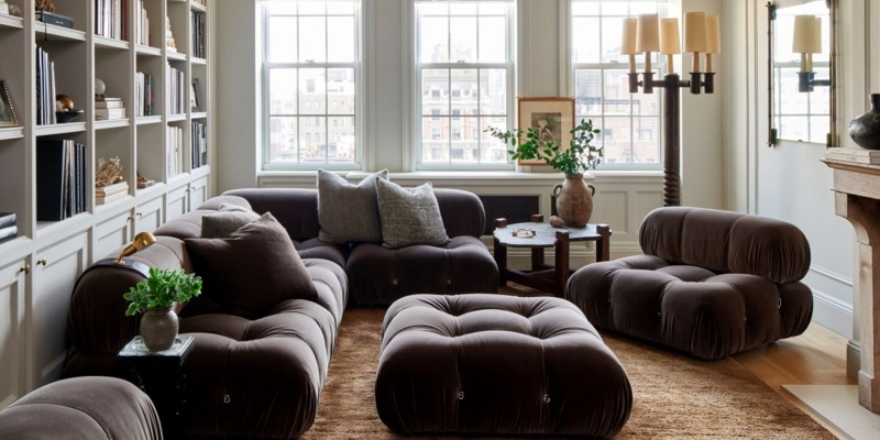 Tan Sectional Sofa, Oversized, Arched Doorway, Plaster Walls