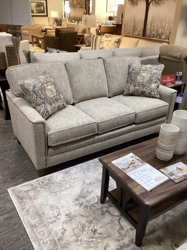 Traditional Sofa with Rolled Arms and Tapered Legs in Tan Fabric