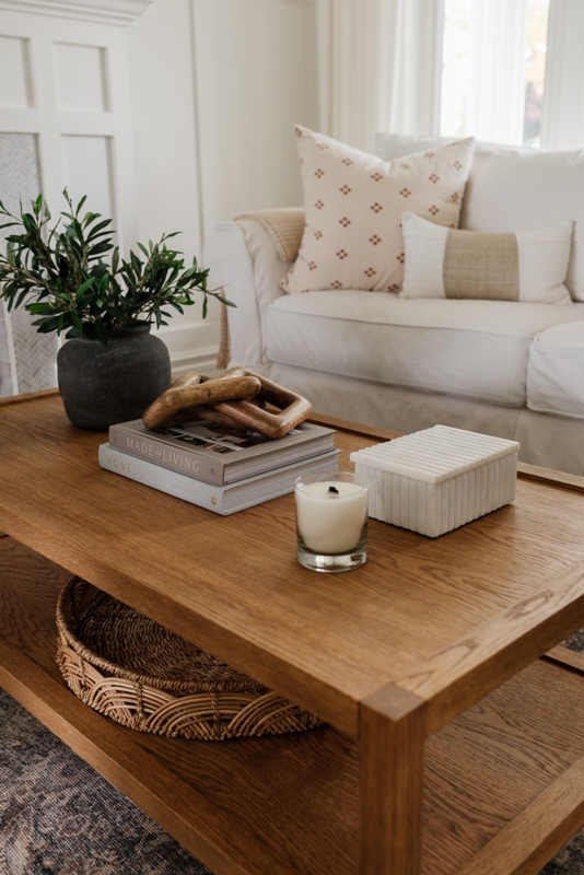 Transitional Coffee Table with Chunky Legs and Full-Length Shelf, Light Tone