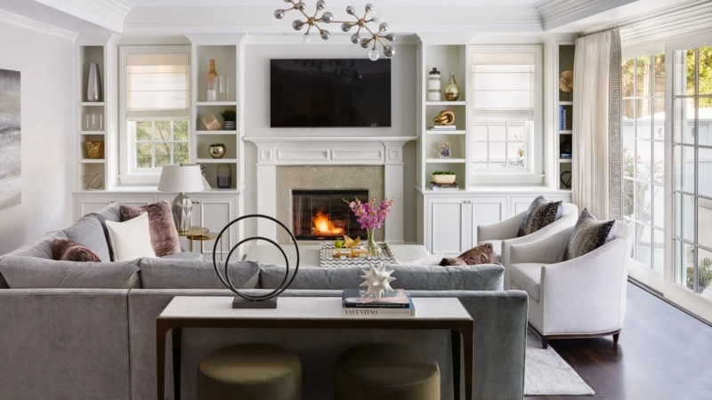 Transitional Living Room featuring Built-in Shelving and Coffered Ceiling