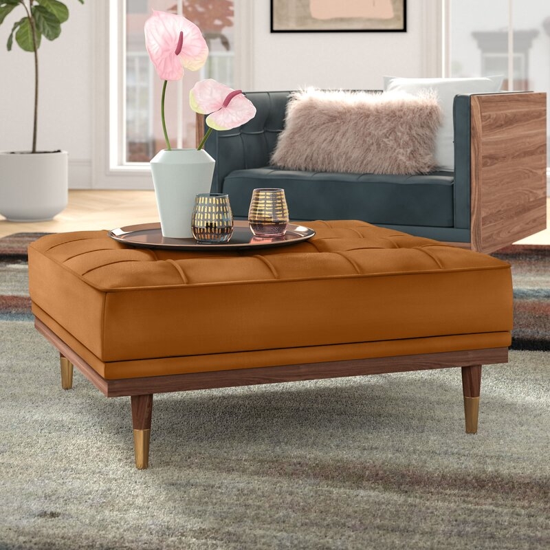 Tufted Ottoman with Brass Feet and Burnt Orange Velvet Upholstery