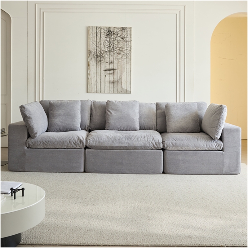 Tufted Seat Sectional Design in Light Gray Fabric with Low-Profile Legs