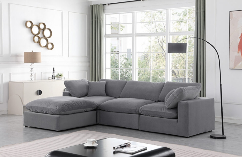U-Shaped Modular Sectional Sofa with Tufted Seat Cushions in Grey Velvet.