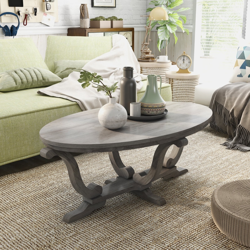 Weathered Gray Oval Trestle Coffee Table with Turned Leg Details