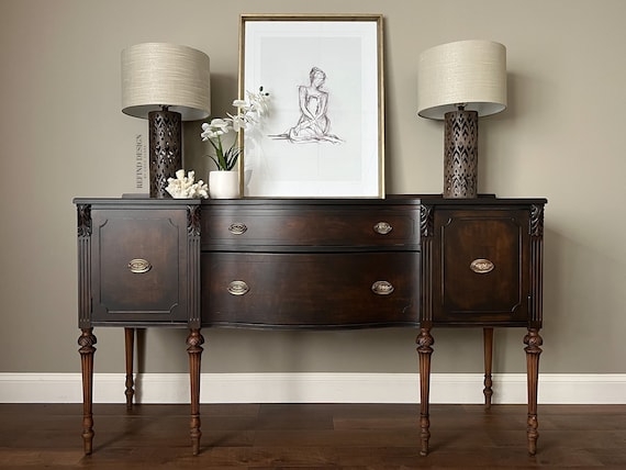 Antique Sideboard with Tall Beveled Mirror Back and Ornate Carvings
