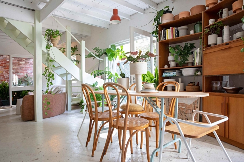 Black Spindle Back Dining Chairs in Mid-Century Modern Room