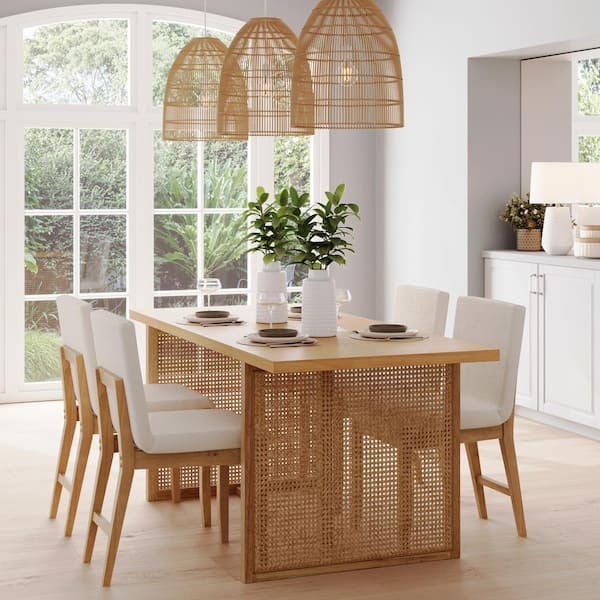 Bohemian Dining Table featuring Rattan Accent Panel and Sled Legs