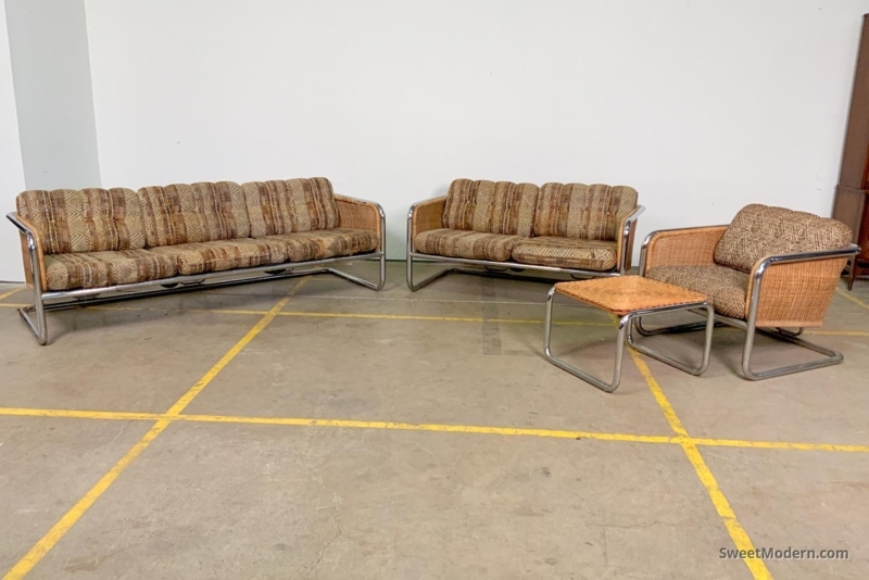 Cane and Chrome Living Room Set with Black Cantilevered Seating.
