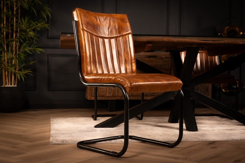 Cantilever Armchair: Brown Quilted Stitching and Padded Arms