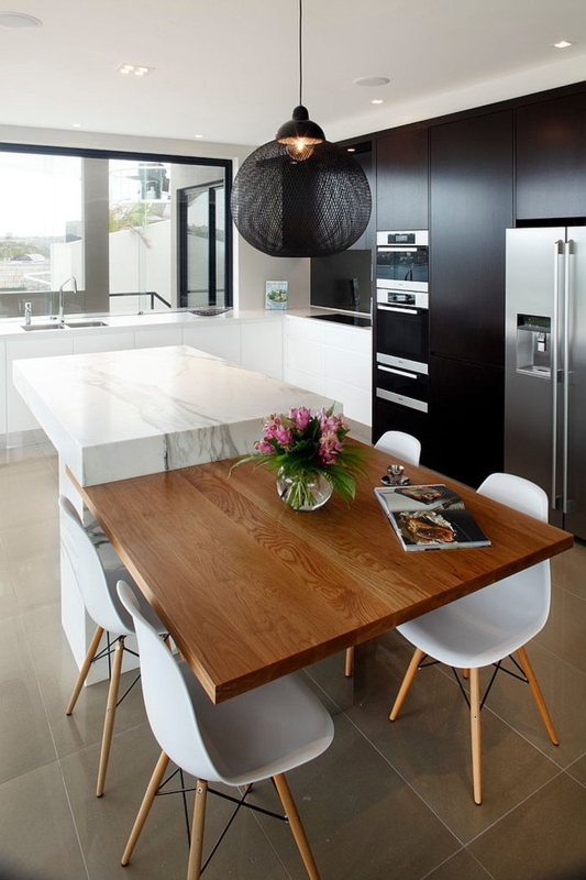 Contemporary Black Kitchen Cabinetry with Handle Less Flat Panel Design