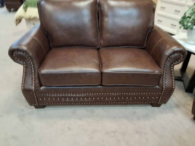 Dark Brown Leather-Like Loveseat with Rolled Arms and Nailhead Trim