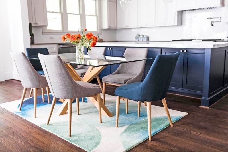 Dining Chair featuring Mid-Century Barrel Back and Matte Black Legs