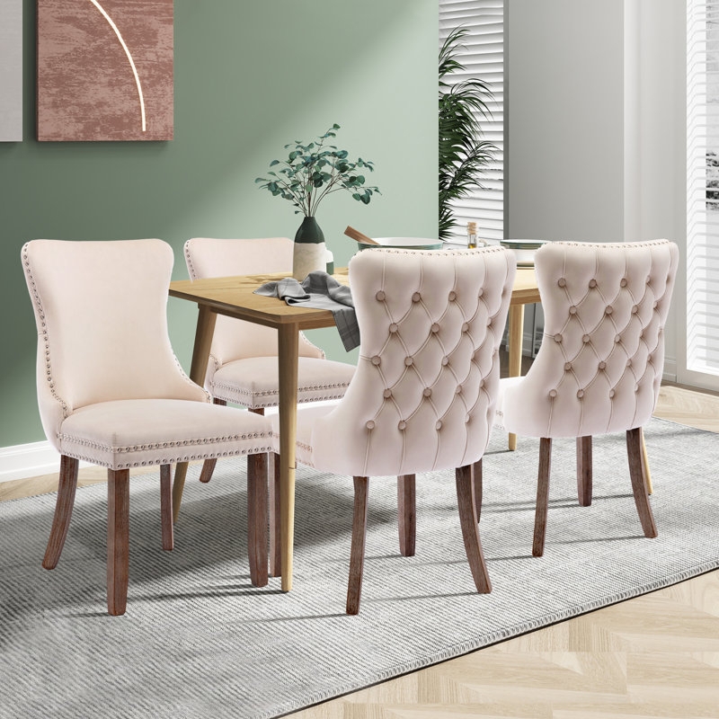 Dining Chair in Navy Velvet with Diamond Tufting and Gold Leg Caps