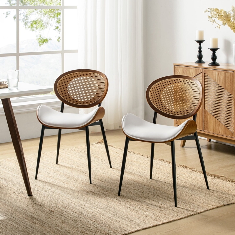 Dining Chairs: Mid-Century Pair with Beige Faux Leather and Rattan Backs.