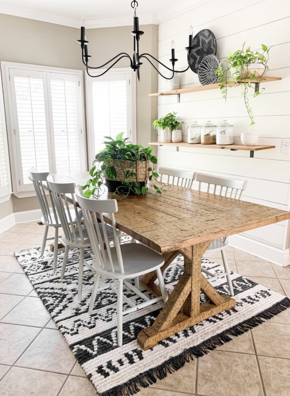 Dining Set with Trestle Base Table and Rustic Ceiling Beams