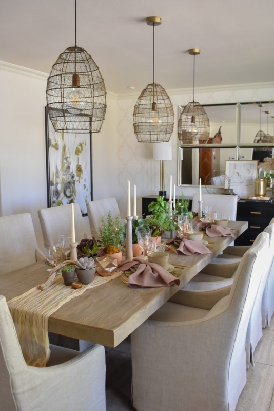Dining Table featuring Dough Bowl Centerpiece and Woven Rattan Chargers