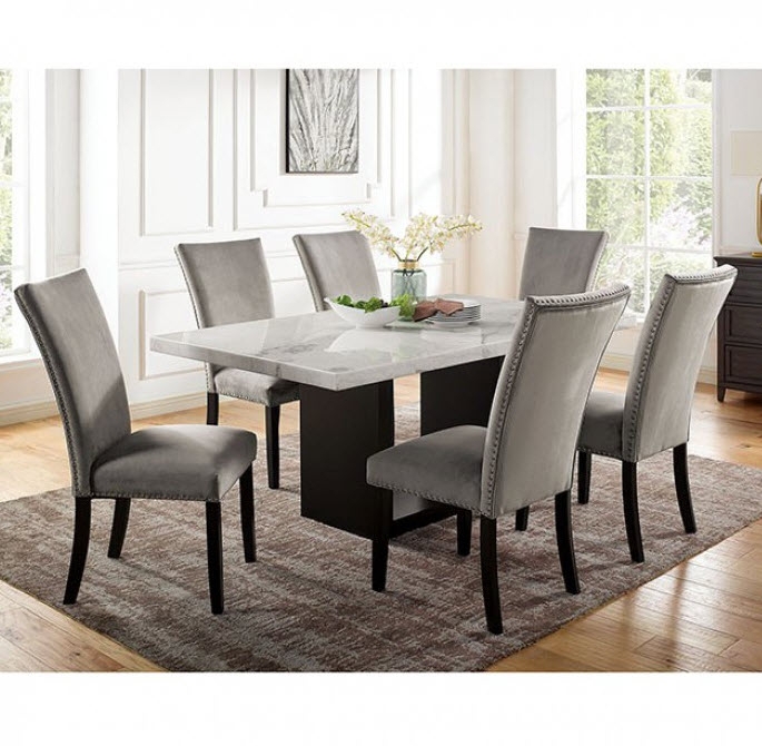 Dining Table featuring geometric pedestal base and marble top