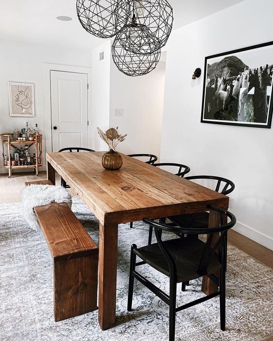 Dining Table in airy room with Sliding Glass Doors and Natural Jute Rug