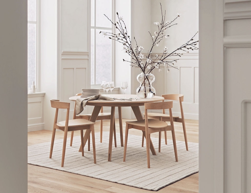Dining Table: Round Light Oak with Black Spindle Chairs and Tapered Legs