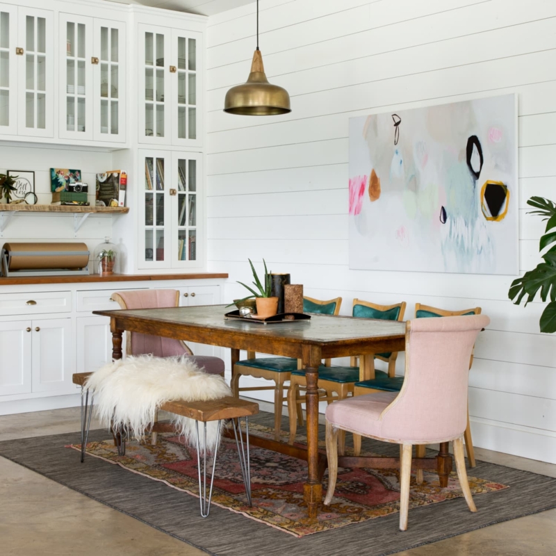 Dining Table Rustic Wood Top Slipcovered Seating Crystal Chandelier