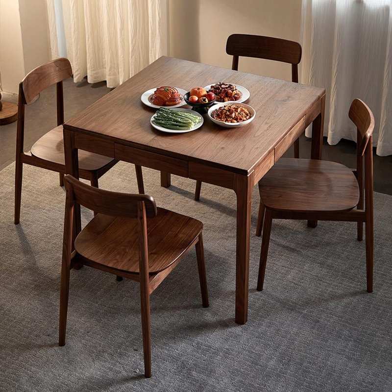 Dining Table Set with Cognac Curved Chairs and Black Pedestal Base