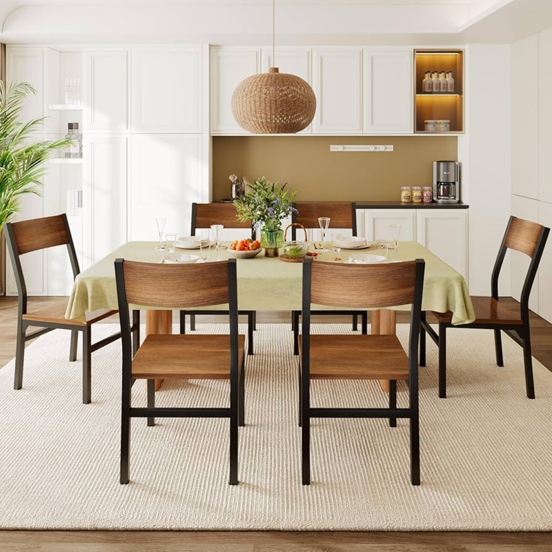 Ergonomic Walnut Dining Chairs with Curved Backs and Black Metal Legs