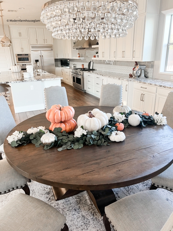 Farmhouse Wood Trestle Dining Table with Eucalyptus Runner styling