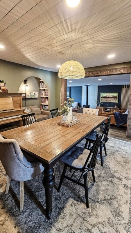 High Contrast Dining Set with Arched Floor Lamp and Wainscoting