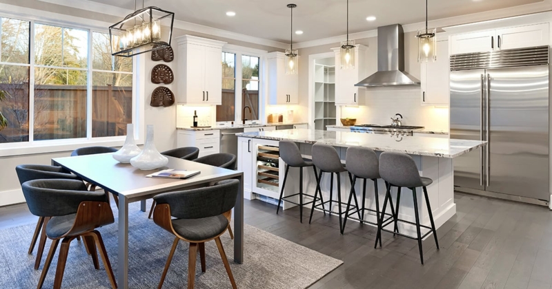 Kitchen Island: Charcoal Transitional Design with Oversized Glass Pendants