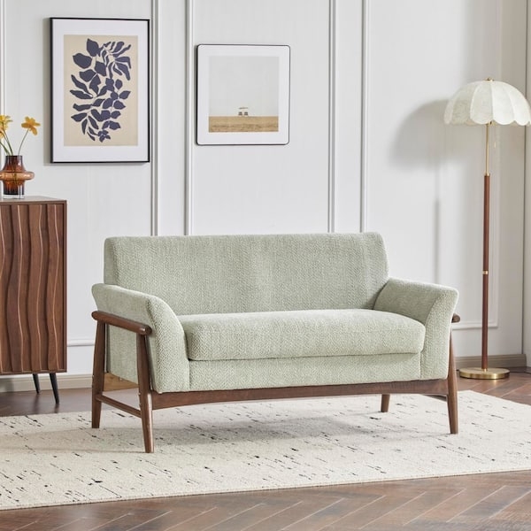 Light Green Boucle Loveseat with Curved Back and Exposed Wood Frame